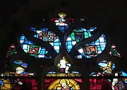 Maßwerk mit Madonna und Wappen der Stifter