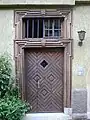 Barocktür von 1769 mit Deutschordenskreuz