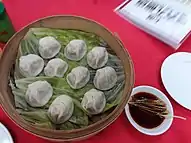 Xiaolongbao mit Sojasauce-Ingwer-Dip