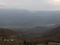 Uricani, im Hintergrund das Vâlcan-Gebirge