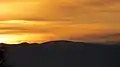 Im Sonnenuntergang von Graz aus gesehen