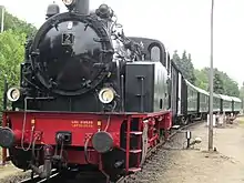 Vereinseigener Dampfzug (gezogen von Lok 2) bei der Einfahrt in den Bahnhof Harpstedt
