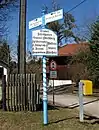 Wegweiser und Ortsschild in Jettenhausen