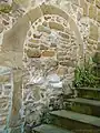 Vermauertes Portal datiert 1547 am Staffelgiebelhaus
