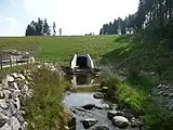 Auslaufbauwerk mit Fischtreppe (4) und anschliessendem Tosbecken (5)