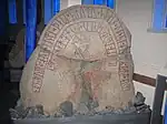 Bildstein DR 282 mit einem Axtträger