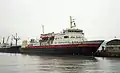 Die Edro III (noch als Sunnmøre), hinter der Midnatsol befindlich, 1983 im Hafen von Trondheim