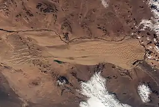 Dünen des Mongol Els von der ISS; das Bild zeigt ungefähr eine Breite von 120 km