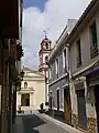 Blick aus der Straße Carrer Major auf die Himmelfahrts-Kirche