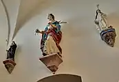 Figuren in der Turmhalle,Mitte: St. Appolonia