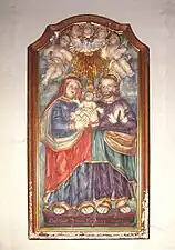 Holzrelief: Joachim und Anna mit Maria als Kleinkind
