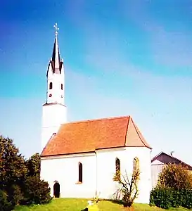 Michael Wening: „Schloß Wasentegernbach“ um 1715; im Bild links oben: Wappen der Fürstpropstei Berchtesgaden mit Mittelschild des langjährigen Fürstpropstes bzw. kurkölnischen Administrators der Fürstpropstei Joseph Clemens von Bayern rechts: Kirche St. Johannes von Süden
