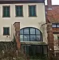 Durchfahrt Herrenhaus Nordseite, mit mittelalterlichen Mauerwerksresten