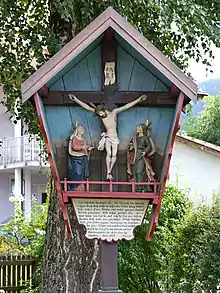 Kreuzgruppe in Völs (Tirol) aus dem zweiten Drittel des 17. Jahrhunderts, erinnert an die Pest von 1637.