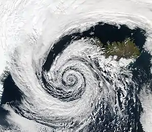 Tiefdruckwirbel über Island im Sep. 2003 aus ca. 700&nbsp;km Höhe fotografiert
