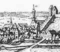 Ausschnitt aus dem Kupferstich Merians von 1642. Links das Münchner Törl (s.u) und rechts das Münchner Tor, mit der Mauer hinauf zum Domberg. Im Hintergrund die Gottesackerkirche St. Maria und die Pfarrkirche St. Georg
