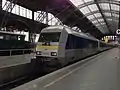 Siemens ER20 223&nbsp;144 mit Rei­se­zug­wa­gen, die zu­vor bei der Nord-Ost­see-Bahn ein­ge­setzt wa­ren, im Bahn­hof Leip­zig Hbf als RE6 nach Chem­nitz (Januar 2016)