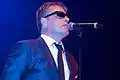 Leadsänger Graham "Suggs" McPherson (* 1961), 2008