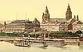 Bildausschnitt aus einem Postkartenmotiv, Stadthalle links im Bild, rechts der Dom