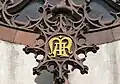 Ave-Maria-Monogramm auf der Portalspitze