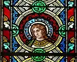 Detail eines Glasfensters im Chor mit der heiligen Maria Magdalena