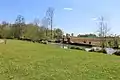 Parkanlage und Mühlwehr am Menthon