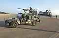 Ein malaysisches Fahrzeug vom Typ GD&nbsp;290 mit einem M2-Maschinengewehr