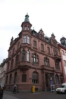 Universitätsplatz Heidelberg Eckgebäude, erbaut 1900–1901 nach einem Entwurf von Jakob Henkenhaf und Friedrich Ebert