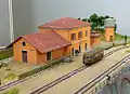Modell des Bahnhofs Lauria mit einem Schienenbus der Reihe M1 „Emmina“ in Nenngröße H0 an der Hobby Model Expo 2012