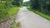 Der Muckbachtalradweg über die Gleise der ehemaligen Bahnstrecke Tauberbischofsheim–Königheim