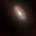 Falschfarbendarstellung des Zentrums der Galaxie, aufgenommen mit der NICMOS-Kamera des HST bei 1,1&nbsp;µm, 1,6&nbsp;µm und 1,9&nbsp;µm.
