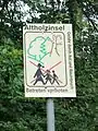 Schild mit Warnhinweis auf Altholzinsel