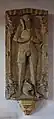 Grabplatte des Johann VI. von Hagen, Herr zur Motten und Büschfeld, Zweibrücker Rat, (1525–1569), verheiratet 1546 mit Beatrix Zandt von Merl, verheiratet 1558 mit Agnes Schenk von Schmidtburg; Ahnenwappen an den Plattenecken