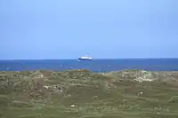 Die Nordic auf Reede vom Norderneyer Leuchtturm aus gesehen