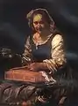 Ältere Frau beim Nähen