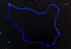 NASA-Bild des Atolls,mit der Insel im Nordwesten