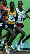 Stephen Kiprotich (gelbes Trikot)Rang sechzehn in 14:04,22&nbsp;min