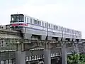Zuggarnitur Nr. 23 vom Typ 1000 kurz vor der Station Minami Ibaraki