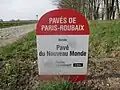 Hinweistafel Beginn Abschnitt Pavé du Nouveau Monde