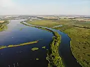 Peene bei Anklam. Links das größte Torfstichgebiet an der Peene mit 1,2&nbsp;km².