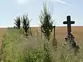 Landschaft und Wegkreuz bei Pettonville