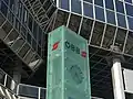 Der Pflatsch und die Wortmarke-Pflatsch-Kombination an einer Bahnhofsuhr vor dem Franz-Josefs-Bahnhof in Wien, Februar 2019