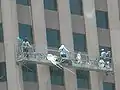 Reinigung eines Fenster mit einer Gondelanlage