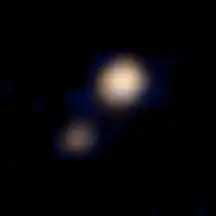 9.&nbsp;April 2015: Erstes Farb­foto von Pluto und Charon