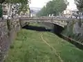 Der Mugnone und die Brücke Ponte Rosso in Florenz
