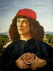 Porträt eines jungen Mannes mit einer Medaille Cosimo de’ Medicis, ca. 1474