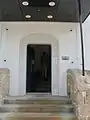 Eingang zum Treppen­haus, datiert auf 1915