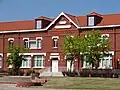 Schule in der Bergarbeitersiedlung Cité de la fosse Sabatier