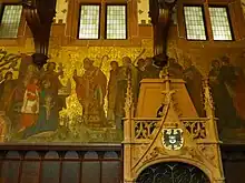 Rathaus St. Johann, Gemälde im Rathausfestsaal:Der heilige Arnulf von Metz weiht die erste Kapelle von St. JohannGraf Johann I. von Saarbrücken übergibt den Freiheitsbrief von 1322