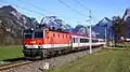 ÖBB 1144 mit aus Wien kommenden IC/REX hinter Ebensee, im Hintergrund der Traunstein